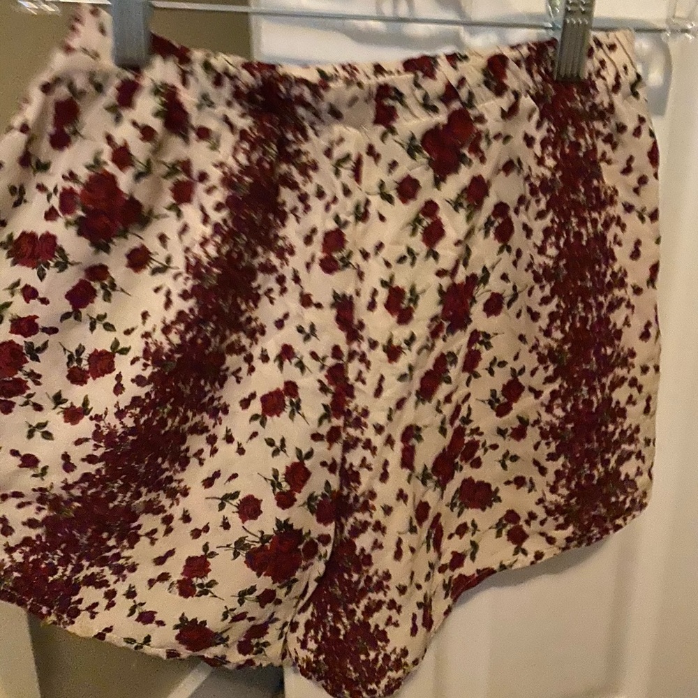 Brandy Melville red and white floral shorts